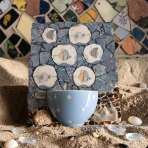 The Fish Bowl — mosaic artwork by Sarah Ramharrack, fish designs on stone with polka dot bowl