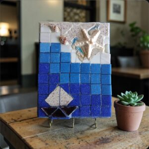 Seabreeze — mosaic keyholder by Sarah Ramharrack, blue and white with starfish and sailboat